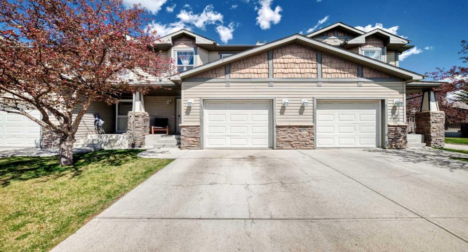 65 Spring Meadows Bay, Okotoks, Alberta T1S2G8, 4 Bedrooms Bedrooms, ,4 BathroomsBathrooms,Residential,For Sale,Spring Meadows,A2312954