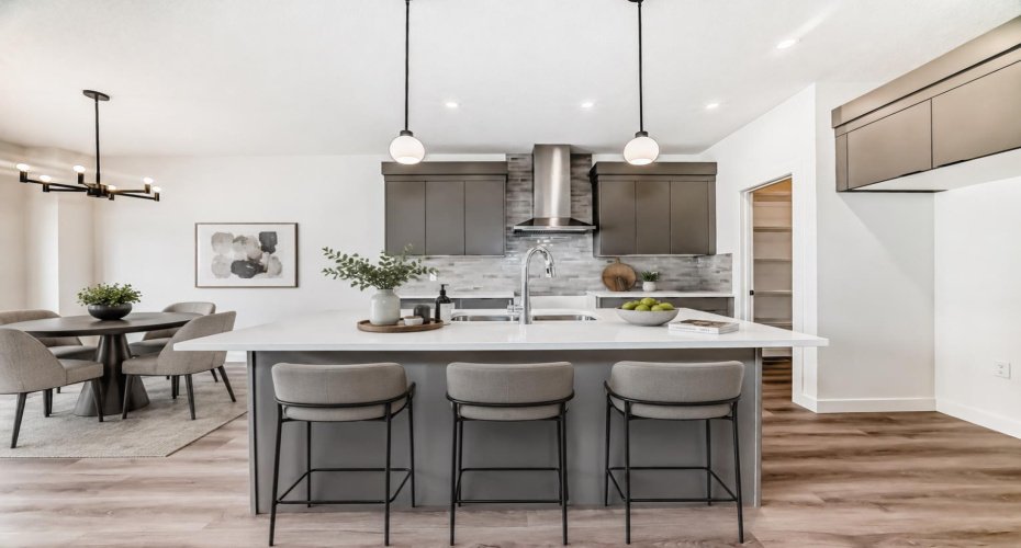 VIRTUALLY STAGED • Kitchen & Dining Nook • PLEASE NOTE: Kitchen appliances are included, and will be installed prior to possession.