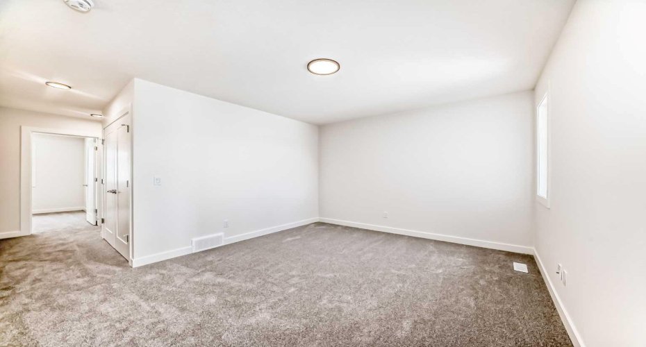Upper Floor Bonus Room and Hallway to Secondary Bedrooms