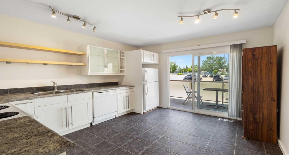 1305 Glenmore Trail, Calgary, Alberta T2V 4Y8, 2 Bedrooms Bedrooms, ,2 BathroomsBathrooms,Residential,For Sale,Glenmore,A2323811