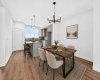 VIRTUALLY STAGED • Dining Area & Kitchen