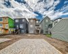 Two-Car Parking Pad & Rear of Home