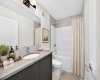 VIRTUALLY STAGED • Upper Floor Main Bath