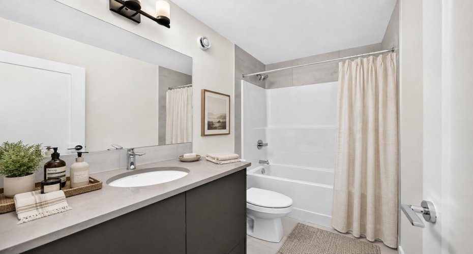 VIRTUALLY STAGED • Upper Floor Main Bath