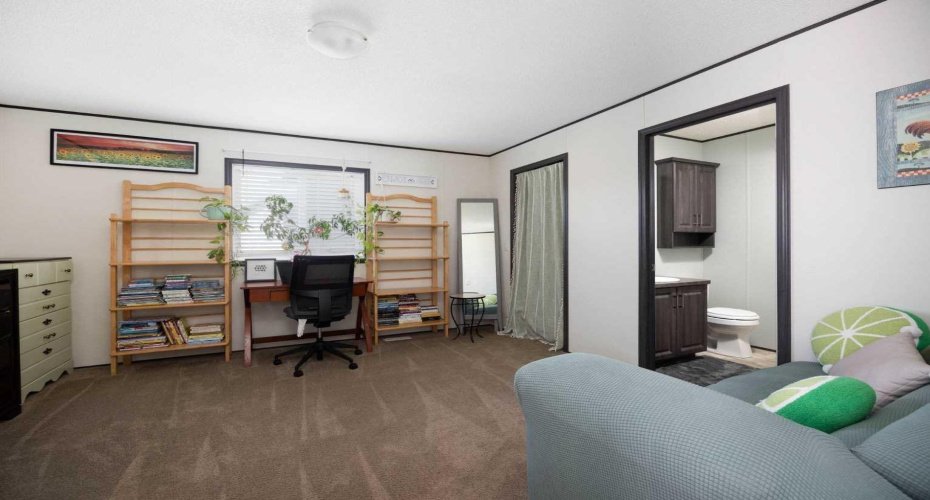 Primary suite used as office/storage