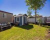 Fenced yard with a shed