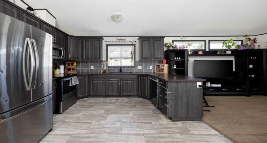 Beautiful back splash with window over the sink