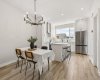 Whether you're hosting holiday dinners or enjoying casual weeknight meals, the spacious dining area flows effortlessly into the beautifully designed kitchen, making entertaining both easy and enjoyable.