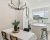 From casual breakfasts to holiday celebrations, this open dining space flows effortlessly into the beautifully appointed kitchen, making entertaining as enjoyable as everyday living.