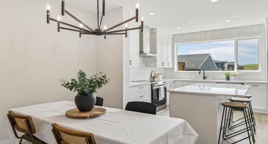 From casual breakfasts to holiday celebrations, this open dining space flows effortlessly into the beautifully appointed kitchen, making entertaining as enjoyable as everyday living.