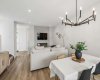 The heart of the home is thoughtfully designed for everyday living, offering an open-concept layout that brings together the kitchen, dining, and living spaces in one bright, connected environment perfect for entertaining and making memories.