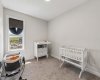 Thoughtfully sized and beautifully bright, this bedroom offers endless versatility as a nursery, child's bedroom, guest suite, or inspiring home office.