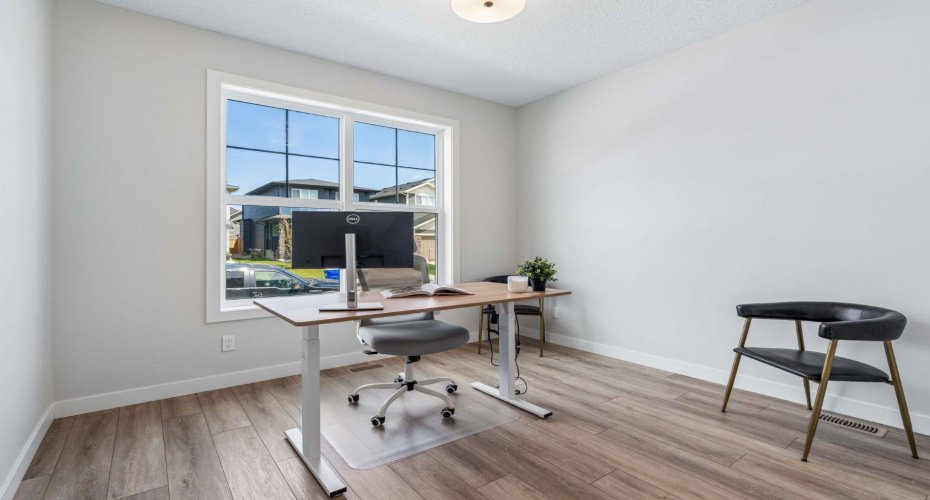 Whether you're working from home, running a business, or creating a quiet study space, the dedicated main floor office offers flexibility, natural light, and privacy—perfect for today's modern lifestyle.