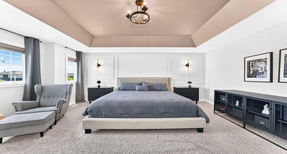 Spacious Primary Suite With Tray Ceiling