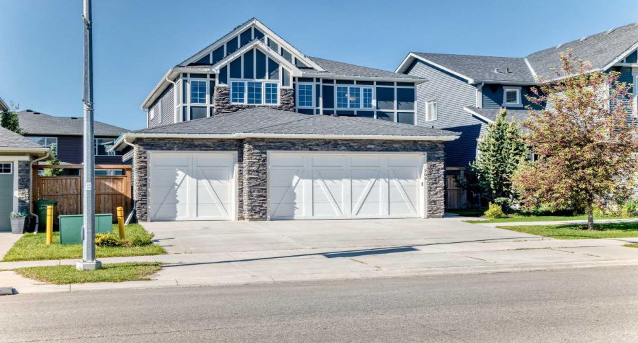 Stone-Accented Exterior With Triple Garage