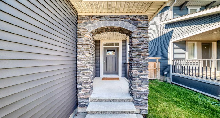 Covered Front Entry With Stone Archway