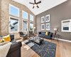 Vaulted Living Room With Brick Feature Wall