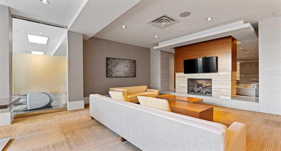Social lounge with TV & Fireplace.
