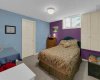 2nd bedroom - lower level. Walk in closet.