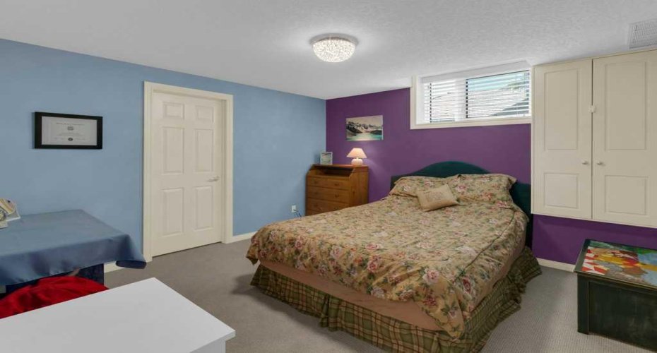 2nd bedroom - lower level. Walk in closet.