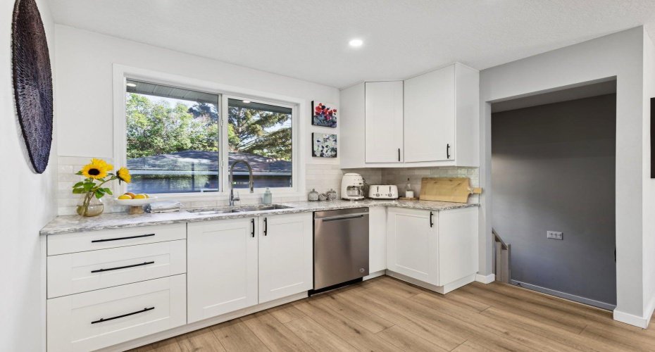 716 Cantree Road, Calgary, Alberta T2W2L5, 3 Bedrooms Bedrooms, ,3 BathroomsBathrooms,Residential,For Sale,Cantree,A2324333