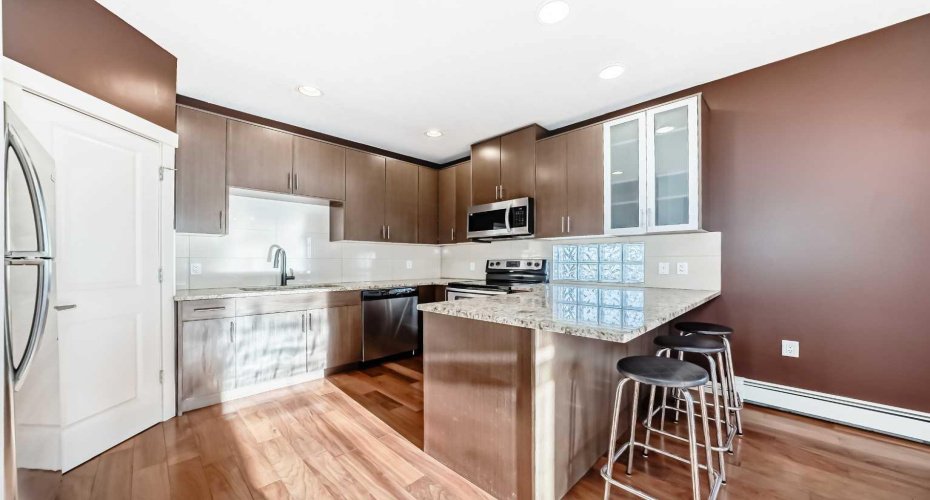 4704 Stanley Road, Calgary, Alberta T2S 2R2, 2 Bedrooms Bedrooms, ,1 BathroomBathrooms,Residential,For Sale,Stanley,A2324392