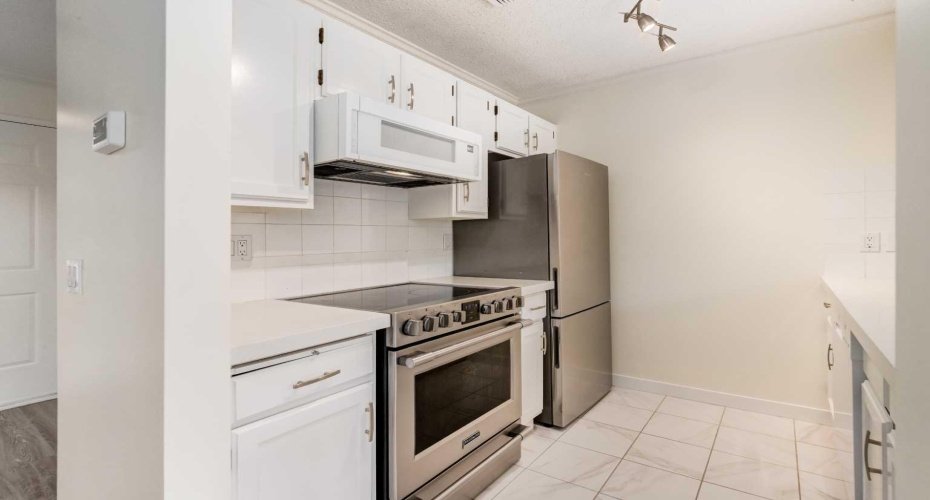 103 Grier Terrace, Calgary, Alberta T2K 5Y6, 2 Bedrooms Bedrooms, ,1 BathroomBathrooms,Residential,For Sale,Grier,A2318561