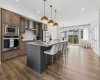 As you walk up the steps to the kitchen this beautiful space is bright, airy and inviting