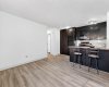 Built-in peninsula with additional bar style seating.