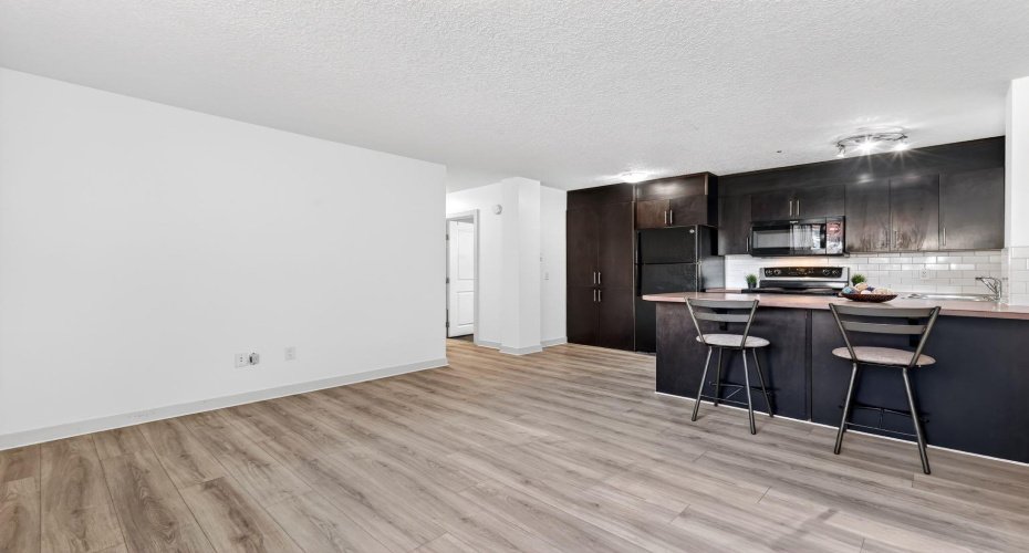 Built-in peninsula with additional bar style seating.