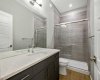 Main floor full bathroom with shower - the home is under construction, so images are of a similar build for illustration purposes.