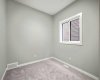 Main floor 4th bedroom - the home is under construction, so images are of a similar build for illustration purposes.