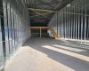 All bays have metal stud walls
