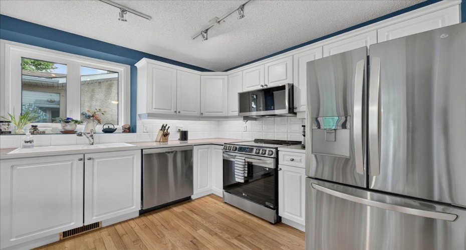 2511 Exshaw Road, Calgary, Alberta T2M4E6, 4 Bedrooms Bedrooms, ,3 BathroomsBathrooms,Residential,For Sale,Exshaw,A2325471