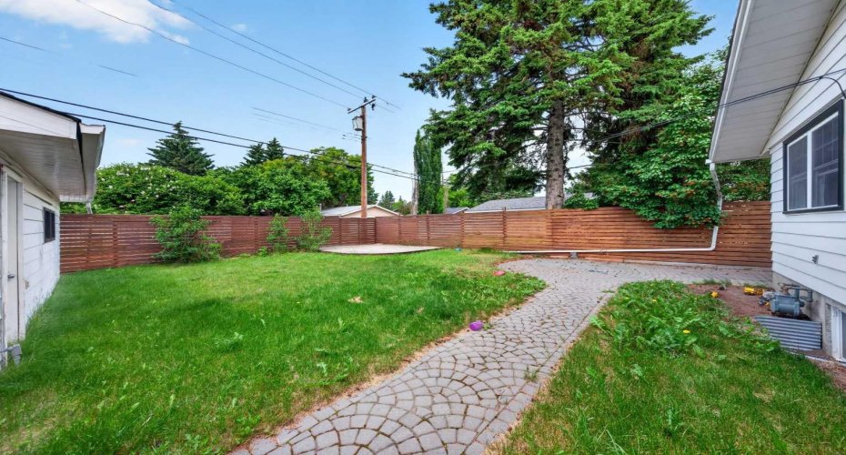 private back yard with a deck and patio