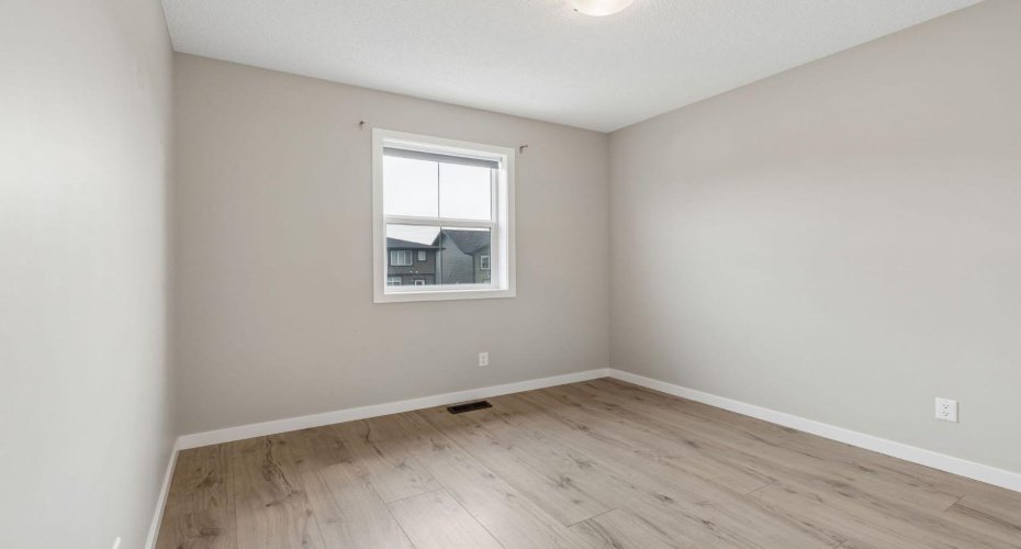 Bedroom 2, bright, versatile, and filled with natural light, this bedroom offers the flexibility to grow with your lifestyle—whether it's a peaceful guest retreat, nursery, home office, or comfortable bedroom.