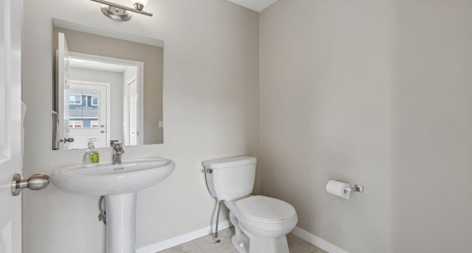 Perfectly positioned for both family and guests, the convenient main floor powder room adds everyday functionality while keeping entertaining effortless.