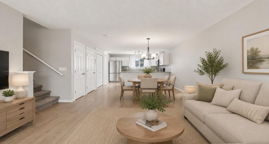 Photo virtually staged to showcase the main floor with furniture