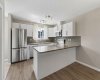 The kitchen is the heart of the home, thoughtfully designed for everything from busy weekday mornings to weekend baking sessions. Gather around the oversized peninsula, prepare meals with ease, and stay connected to family and guests every step of the way.