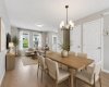 Photo virtually staged to showcase the main floor with furniture
