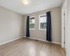 Wake up refreshed in your spacious primary retreat, where large windows fill the room with natural light and create a peaceful atmosphere to unwind at the end of each day.