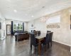 Enjoy a spacious main-floor dining room designed to comfortably accommodate large gatherings, making it ideal for holidays, family dinners, and special occasions.