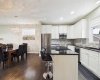 This gorgeous kitchen showcases ample storage space, offering abundant cabinetry to keep everything organized while combining style with everyday functionality.