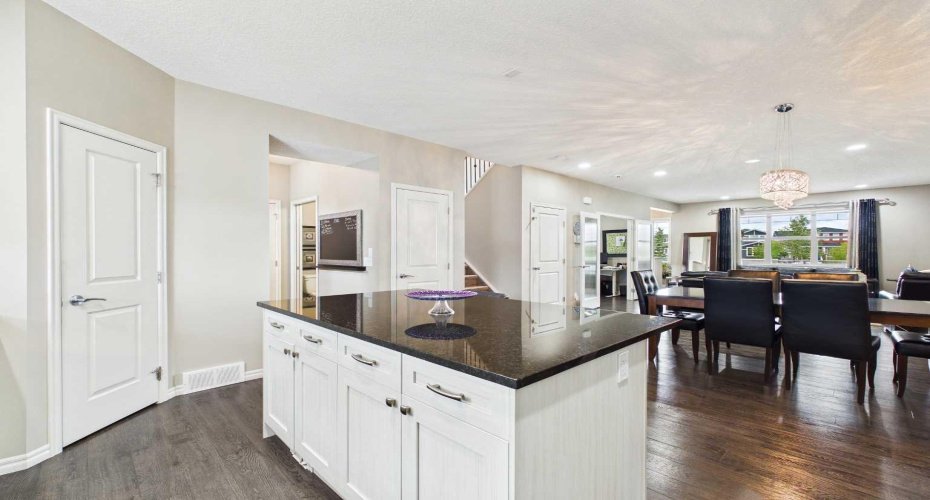 Beautiful granite countertops take center stage in this gorgeous kitchen, complemented by abundant cabinetry and ample storage space for exceptional style and everyday functionality.