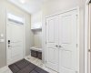 Back entrance and Mudroom with ample storage space.