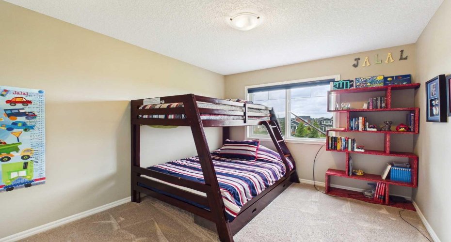 Spacious upstairs Bedroom 3 featuring a large closet and plenty of storage