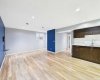 Open-concept basement living area offering flexibility for a lounge, media room, or entertainment space in this non-permitted basement suite.