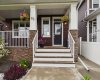 A beautiful main entrance welcomes you with poured concrete walkways and a charming front porch—the perfect place to relax and enjoy the open greenspace views with no neighbours in front.