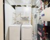 Laundry (Non-Conforming Basement Suite): A separate washer and dryer set is located in the basement for the exclusive use of occupants of the non-conforming (illegal) basement suite, providing added convenience and independent laundry facilities.