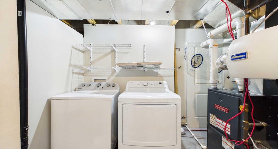 Laundry (Non-Conforming Basement Suite): A separate washer and dryer set is located in the basement for the exclusive use of occupants of the non-conforming (illegal) basement suite, providing added convenience and independent laundry facilities.